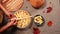 Top view Housewife decorates a homemade apple pumpkin pie with dough stripes, makes flaky lattice, for Thanksgiving Day