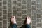 Top view of human bare foot and wear jean on the block cement floor with copy space