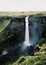 Top view of Icelandic huge waterfall called Haifoss. Grainy film in the style of old photos