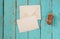 Top view image of blank letter paper and envelope next to colorful pencils on wooden table. vintage filtered and toned