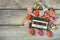 Top view image of colorful heart shape chocolates and audio cassette on wooden table. valentine\'s day celebration concept