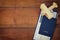 Top view image of flying ticket wooden airplane and passport over wooden table