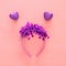 Top view image of funny party head glitter accessory with hearts. Flat lay. Purim celebration concept