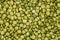 Top view image of grinding green peas natural food background. Top view backdrop