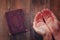 Top view image of mans hands folded in prayer next to prayer book. concept for religion, spirituality and faith