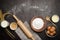 Top view of ingredients bakery making on black wooden table