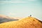 Top view inspirational excited joyful caucasian male cyclist stand on hilltop by red touring bicycle excited enjoy Ararat