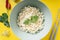 Top view - Instant noodle with Tom Yum ingredient over yellow background