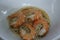 Top view instant noodles with boiled shrimp, popular Asian food concept.