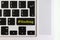 Top view isolated laptop keyboard with yellow `hashtag` text on button, concept design v