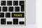Top view isolated laptop keyboard with yellow `start` text on button, concept design f