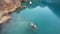 Top view of the Issyk mountain lake and the dam.