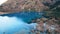 Top view of the Issyk mountain lake and the dam.