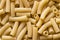 Top view of Italian uncooked tortiglioni pasta