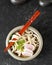 Top View Japanese Kake Udon with Narutomaki Topping