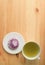 Top View of Japanese Purple Sweet Potato Daifuku or Red Bean Paste Filling Rice Cake with Green Tea on Wooden Table