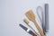 Top view kitchenware wooden rolling pin, wooden spatula and egg beater. Materials or kitchen equipment for