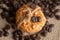 Top view of knotted cookies and coffee beans