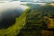 Top view of lake Drivyaty in the forest in the Braslav lakes National Park at sunset, the most beautiful places in the city of