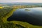 Top view of lake Drivyaty in the forest in the Braslav lakes National Park at sunset, the most beautiful places in the city of