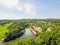 Top view lake house with boat storage green trees, golf course