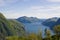 A top view of Lake Lugano, Switzerland from the height of Mount Monte Bre. Beautiful mountain scenery on a sunny summer day.