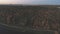 Top view of the landscape of central Russia with trees that are covered with autumn foliage.