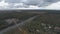 Top view of the landscape of central Russia with trees that are covered with autumn foliage.