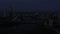 Top view of landscape of evening city with lanterns and river. Stock footage. Beautiful panorama of city with reflection