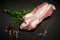 top view on large piece of marbled raw meat with parsley