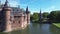 Top view of the largest castle in the Netherlands, De Haar. A beautiful quadcopter flight over the castle, the park and the water