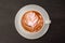 Top view latte art coffee in white mug