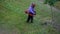 Top view lawnmover man worker cutting dry grass with lawn mower