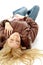 Top view of laying blonde woman with closed eyes