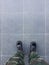 Top View Legs of Army Soldiers in Camouflage Uniform in Black Leather Combat Boots Standing on Selective Focus Copy Space