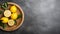Top View Of Lemon In Wooden Dish On Dark Gray Stone Background
