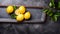 Top View Of Lemon In Wooden Dish On Stone Background