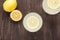 Top view lemonade with fresh lemon on wooden background