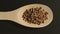 TOP VIEW: Lentils appear in wooden spoon