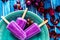 Top view of a Lollipop style grape ice cream on a stick on a vintage plate on a light blue wooden table. Concept of natural and