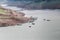 Top view of long-tail touring boats docking at the harbor, in th