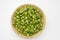 Top view of Lush of Japanese matcha green tea popcorn in the wooden bowl bulk isolated on white background