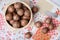 Top view macadamia on napery and wooden bowl