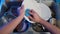 Top view of male hands washing dishes in the kitchen.