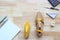 Top view of measuring tape on wooden last shoe on wood background with copyspace