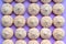 Top view on meringues in line on colored background
