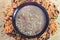 Top view of mess of pottage in bowl on plate