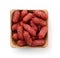 Top view of mini smoked sausages in wooden bowl
