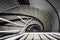 Top view of modern spiral staircase. Interior of multi-storey residential building. Abstract background