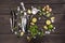 Top view of mojito cocktail ingredients and utensils on wooden table top